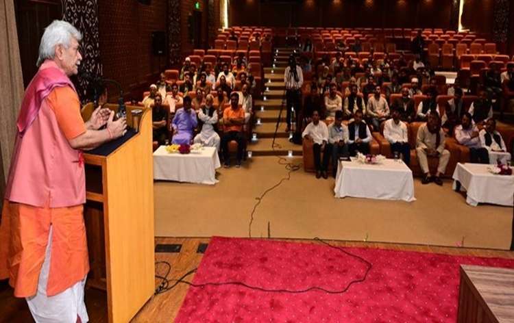 J&K:  Lt Governor Manoj Sinha interacts with a delegation of civilian victims of terrorist violence at Raj Bhawan in Srinagar