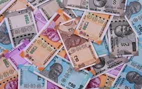 Rupee closes at 83.07 against US dollar