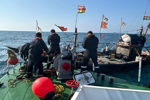 Indian Coast Guard rescues five fishermen from a sinking Indian fishing boat at mid-sea, approximately 50 km from Porbandar