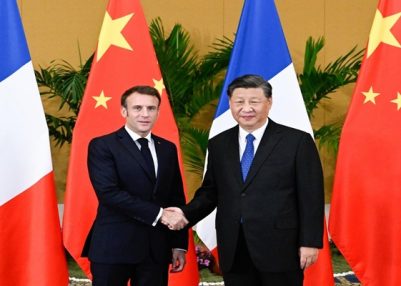 French President meets Xi Jinping in Beijing for talks on Ukraine and trade
