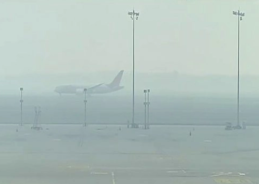 Dense fog engulfs several parts of northern India, disrupts flight and train operations; 64 flights cancelled