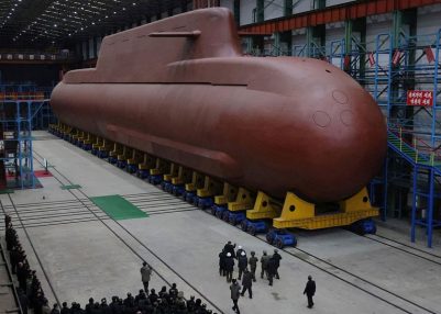 Kim Jong Un Oversees Submarine Construction, Missile Test in North Korea