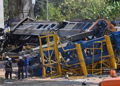32 dead and 65 injured as crane collapses onto moving train in Thailand
