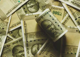 Rupee rises 4 paise to close at 90.91 against US dollar