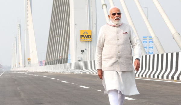 Defence Minister Singh congratulates PM Modi for being longest-serving head of government in India