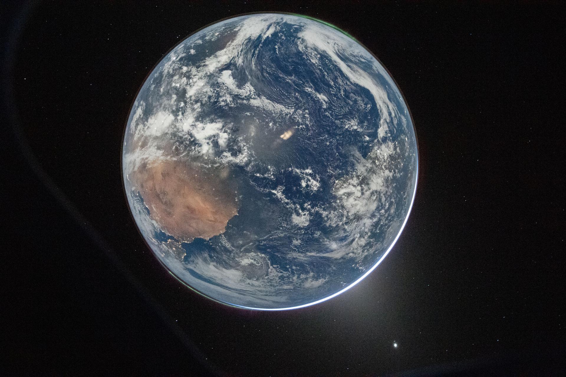 NASA’s Artemis II astronauts send stunning images of Earth from near the moon