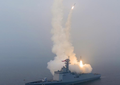 North Korea leader Kim Jong Un oversees missile tests from new warship