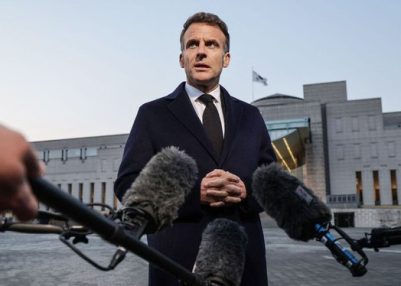 President Emmanuel Macron says France considers it unrealistic to reopen Strait of Hormuz through military action