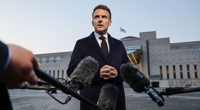 President Emmanuel Macron says France considers it unrealistic to reopen Strait of Hormuz through military action