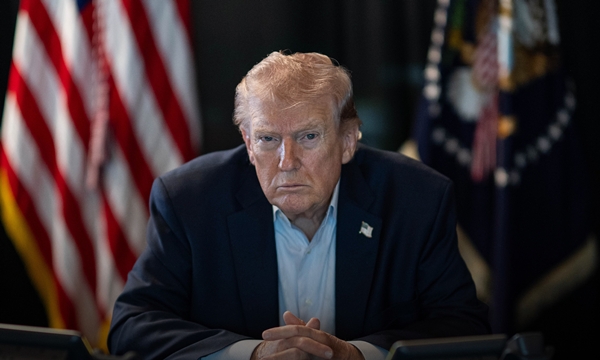 US President Donald Trump warns Iran after US ships transit Strait of Hormuz under fire